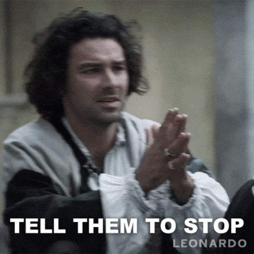 “Person gesturing to stop with text saying ‘TELL THEM TO STOP.’”